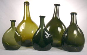 group of round-bodied glass bottles